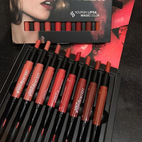 Set of lip glosses with visible brand name on a dark background