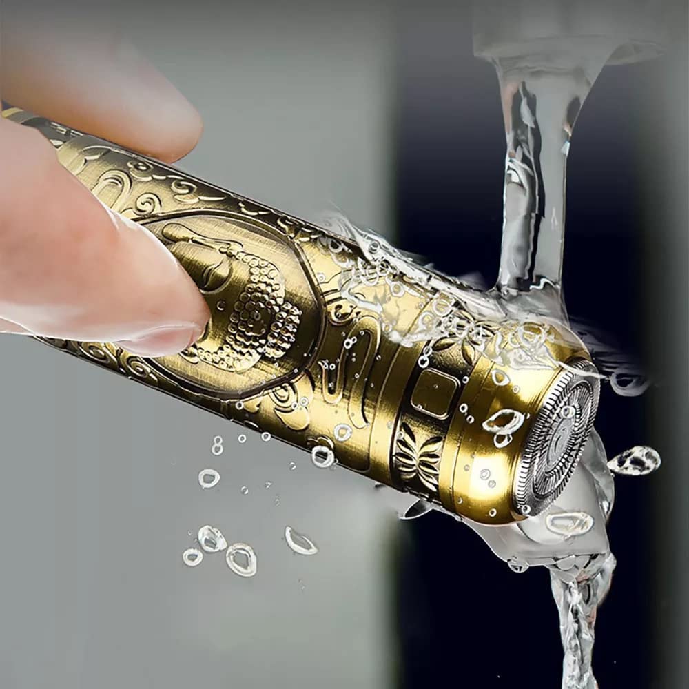 Gold electronic device being submerged in water with a hand holding it.