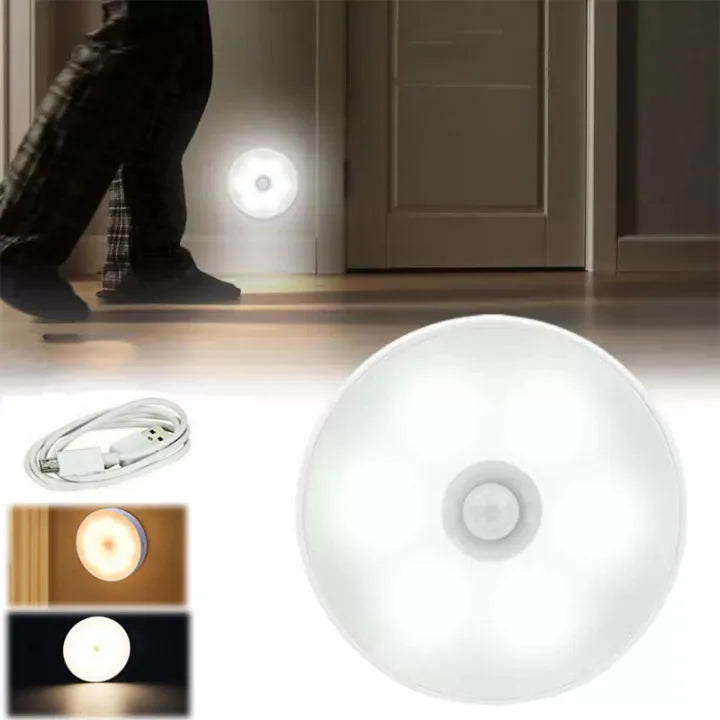 Infrared sensor light on a white background with a person standing nearby.