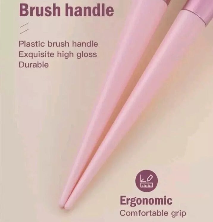 Pink brush handle with text on a beige background