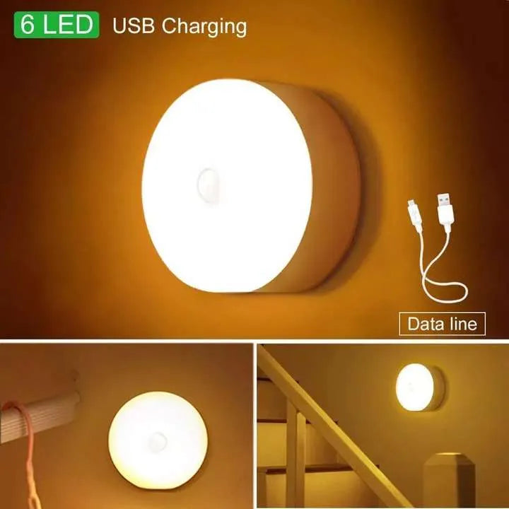Round wall light with USB charging feature on an orange background