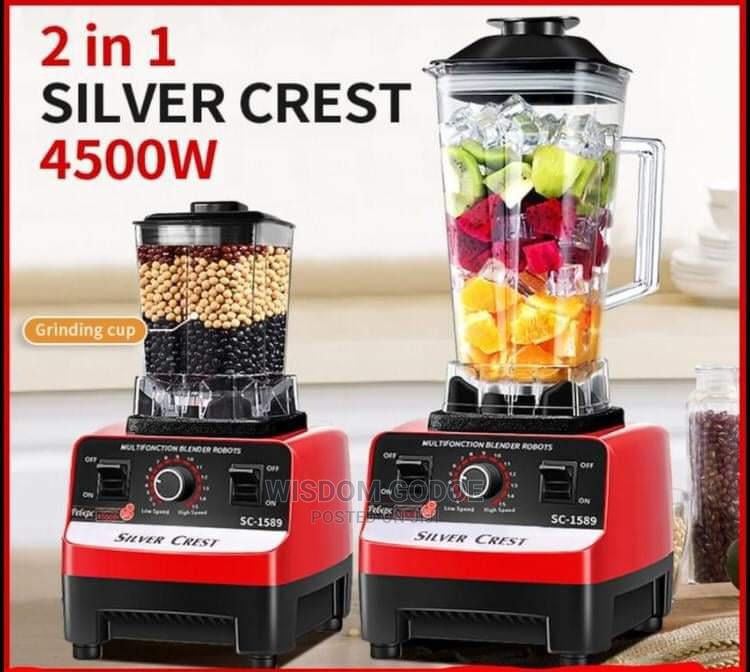 2-in-1 Silver Crest blender with grinding cup and fruit blend on a kitchen counter.