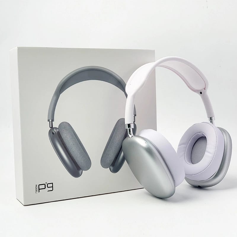 White headphones with gray accents next to their packaging on a white background